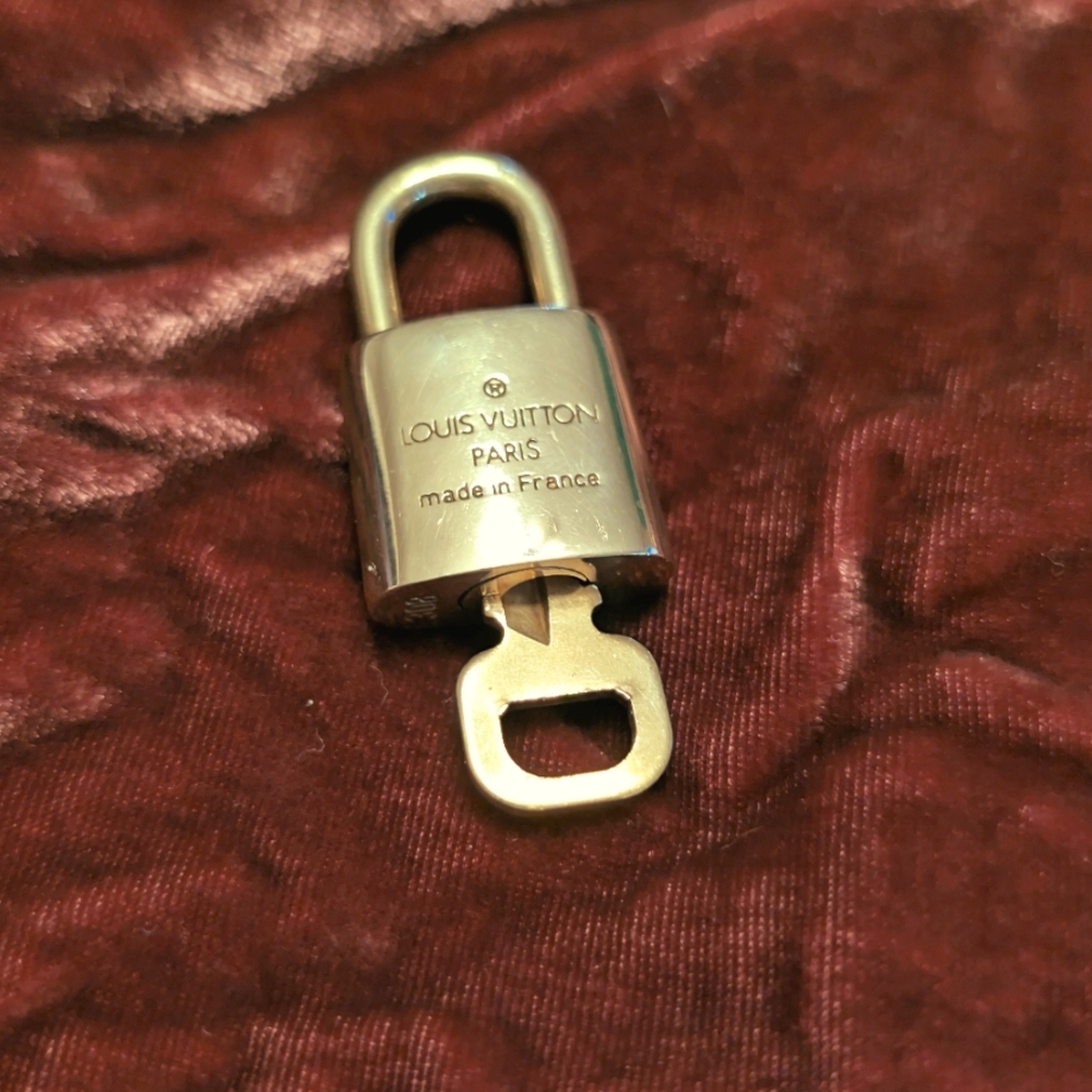 LV Louis Vuitton brass lock and key 308